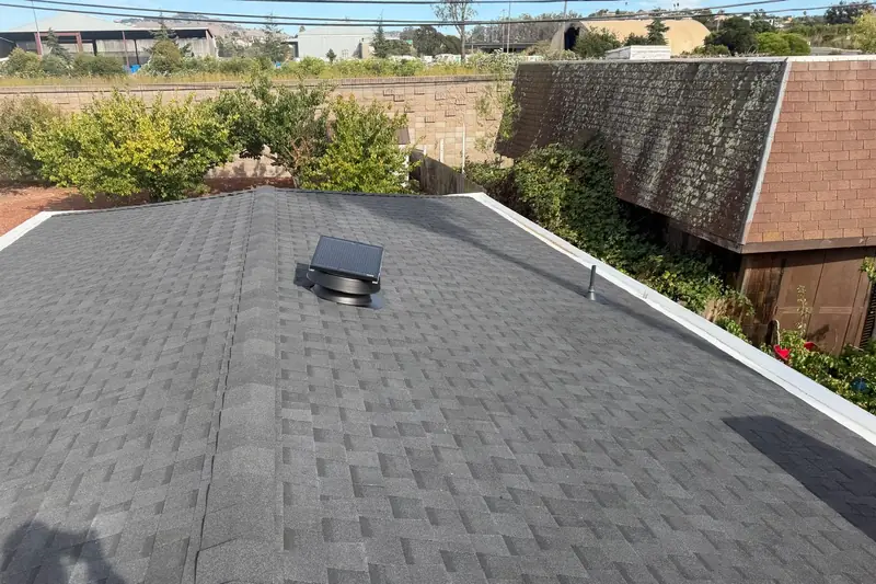 Finished CertainTeed Landmark roof in Moire Black with a roof vent on a home in Vallejo, CA